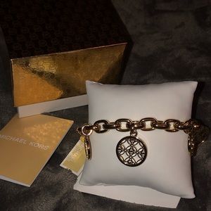 Brand New Michael Kors charm bracelet
